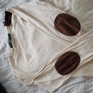 Cream colored Ralph Lauen shirt with faux suede brown trim.